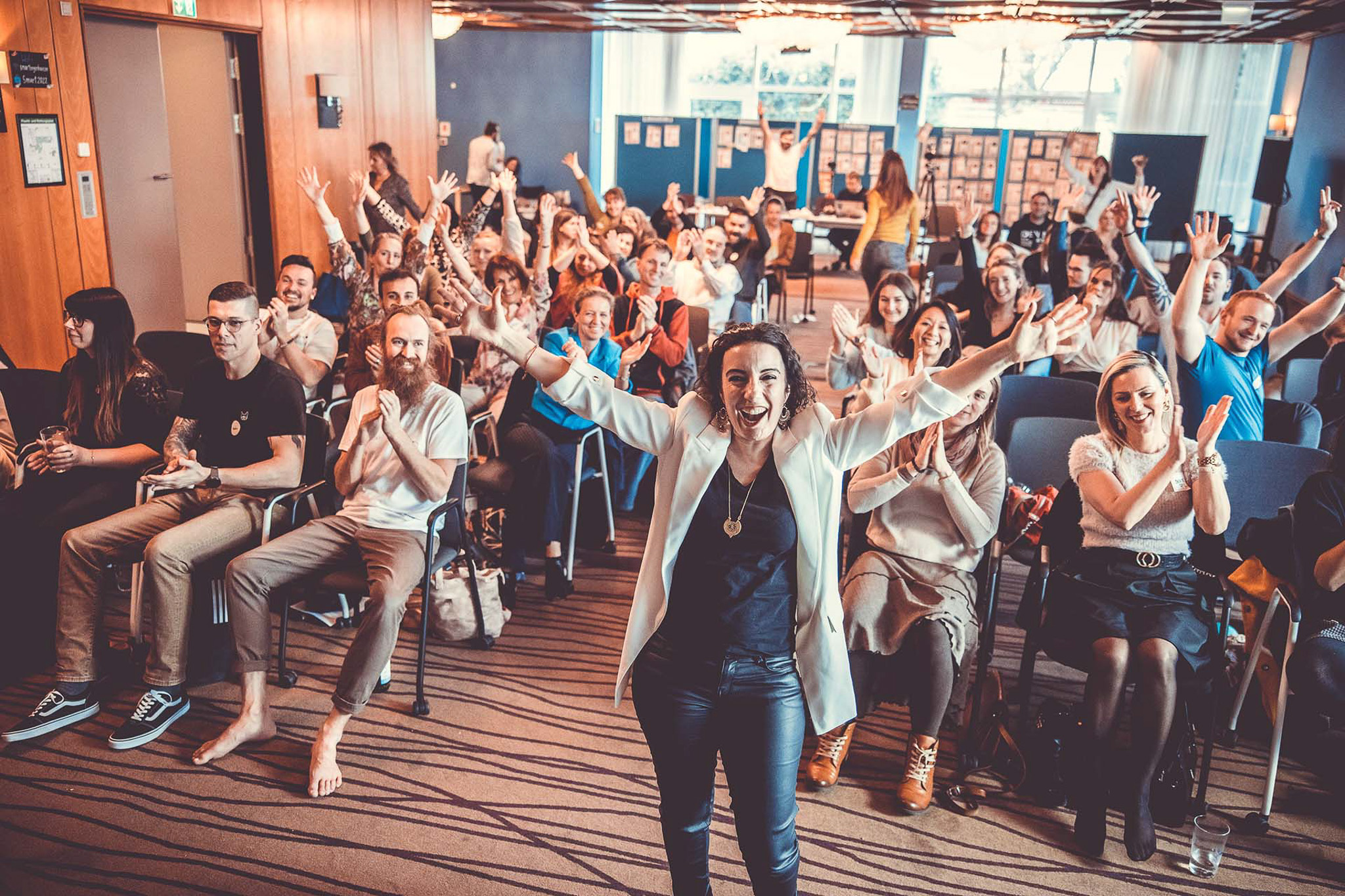 Cheering audience at the Branding Days Munich
